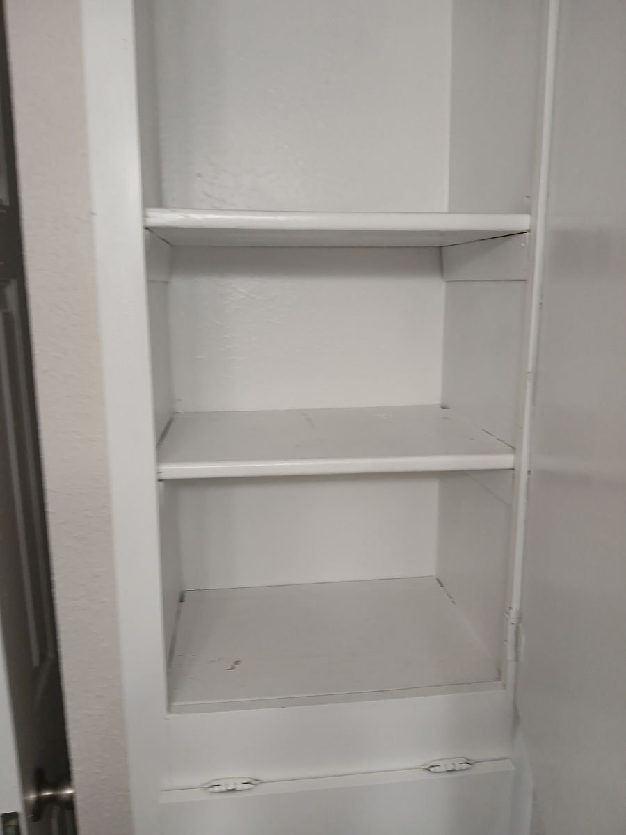 Compact refrigerator after cleaning — detailed and inspection-ready