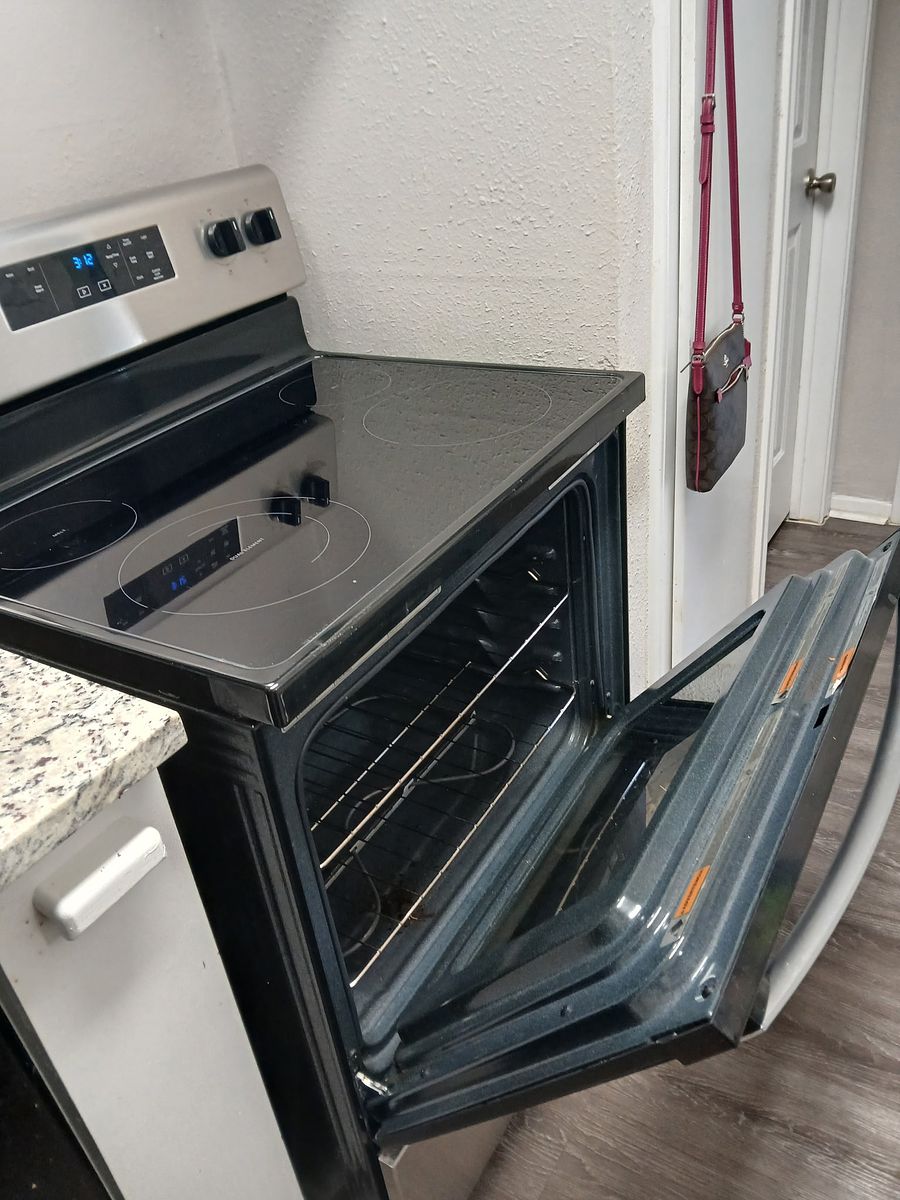 Range and oven after cleaning — detailed and inspection-ready