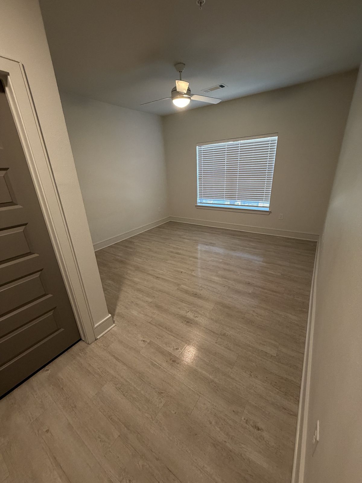 Kitchen after cleaning — cabinets, counters, and appliances ready to show
