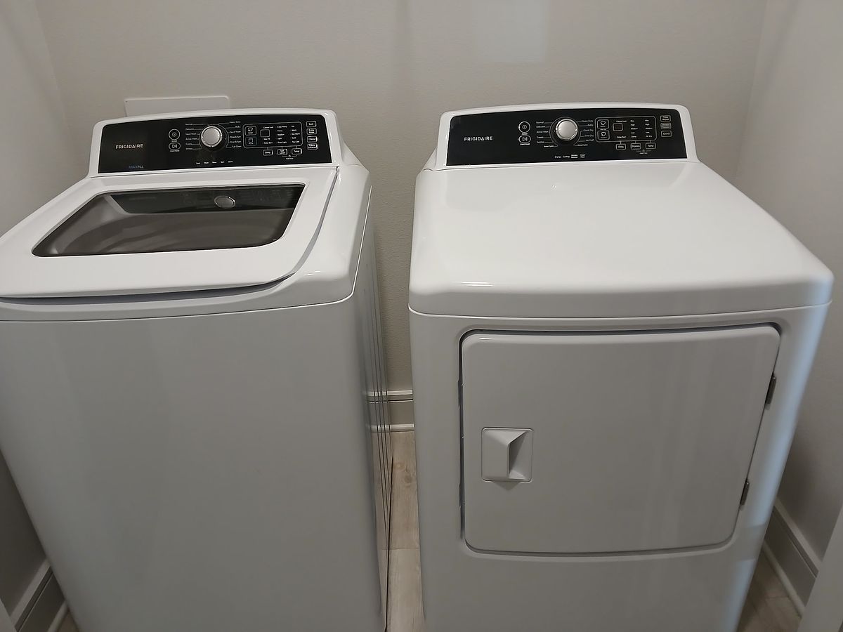 Laundry room after cleaning — wiped down and inspection-ready