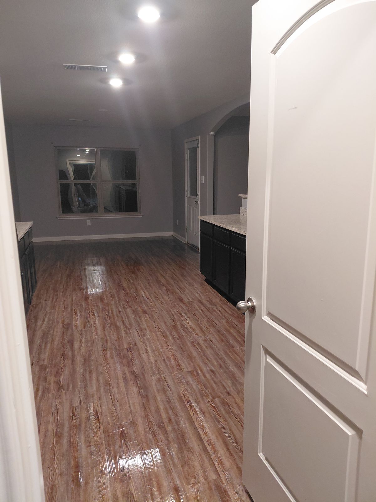 Kitchen and living area after cleaning — reset and ready to show