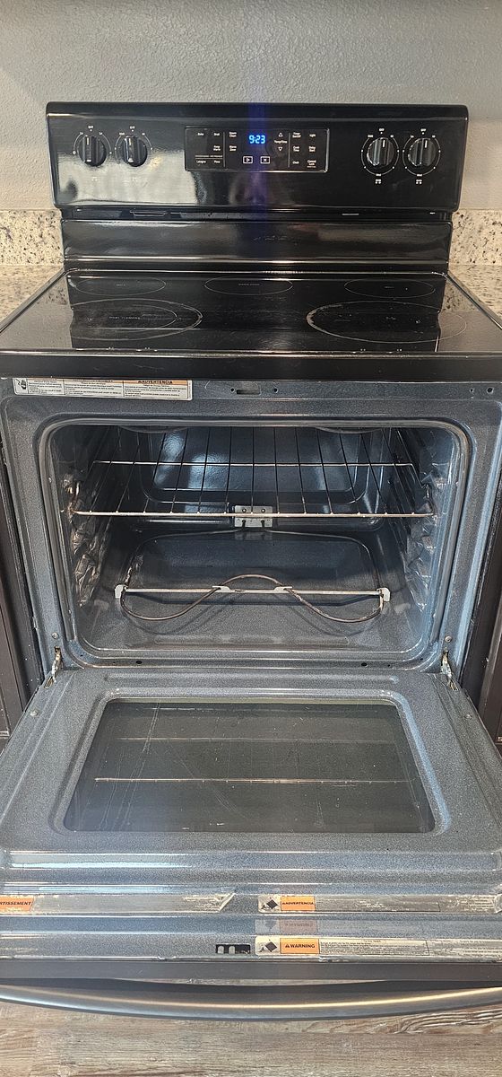 Range and oven after cleaning — restored and inspection-ready